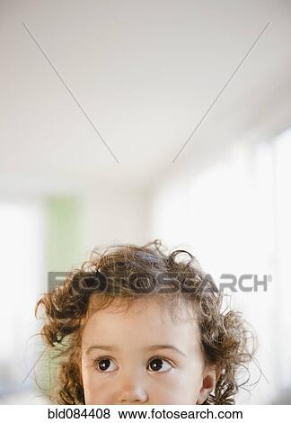 Stock Photo - Serious mixed race girl. Fotosearch