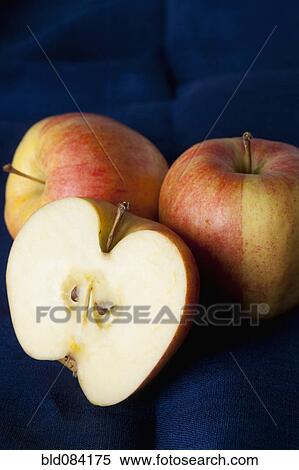 Sliced and whole apples View Large Photo Image Stock Photography - Sliced and whole apples. Fotosearch