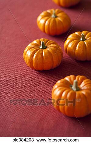 Stock Image - Small Halloween pumpkins. Fotosearch
