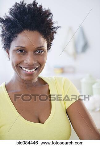 Stock Photograph - Smiling Black woman. Fotosearch