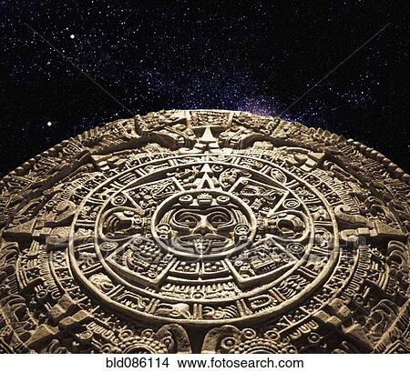 Picture - Aztec calendar stone carving in space. Fotosearch