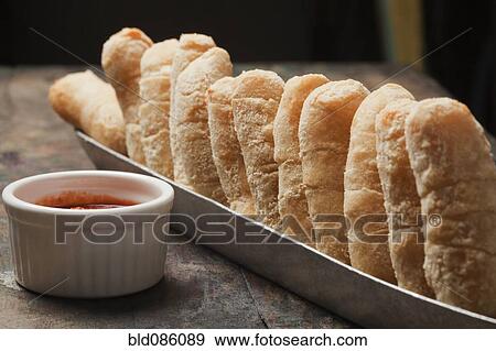 Bread in basket and dipping sauce View Large Photo Image Stock Photo - Bread in basket and dipping sauce. Fotosearch