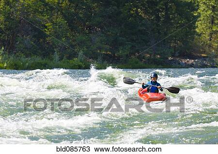 Caucasian girl kayaking in river View Large Photo Image Stock Image - Caucasian girl kayaking in river. Fotosearch