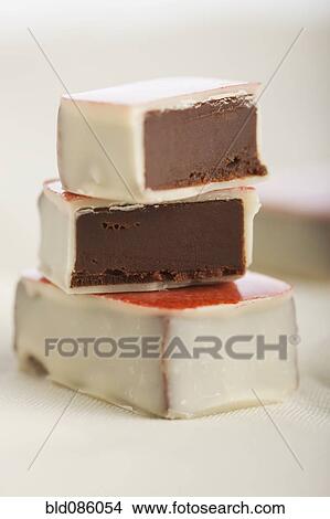 Picture - Close up of chocolate candies. Fotosearch