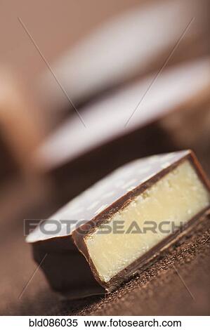 Close up of chocolate candy View Large Photo Image Stock Photography - Close up of chocolate candy. Fotosearch