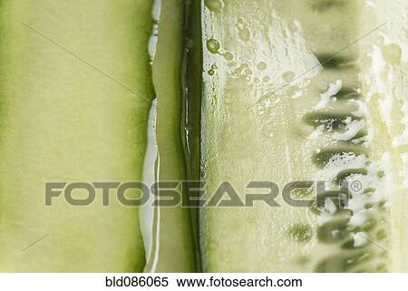 Close up of sliced cucumber View Large Photo Image Stock Photography - Close up of sliced cucumber. Fotosearch