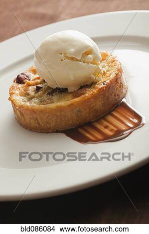 Picture - Close up of tart and ice cream on plate. Fotosearch