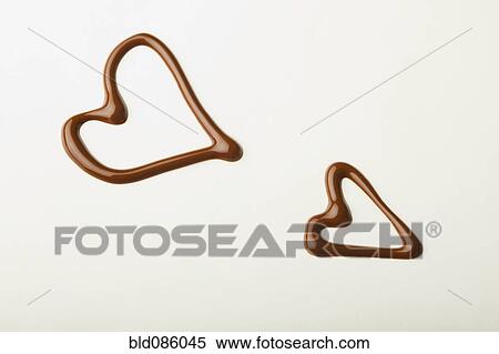 Hearts drawn in chocolate View Large Photo Image Stock Photography - Hearts drawn in chocolate. Fotosearch
