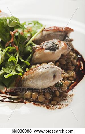 Stock Photo - Salad and seafood entree on plate. Fotosearch