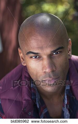 Serious African American man outdoors View Large Photo Image Stock Image - Serious African American man outdoors. Fotosearch
