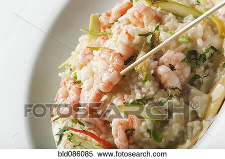Stock Photography - Shrimp and rice entree in bowl. Fotosearch