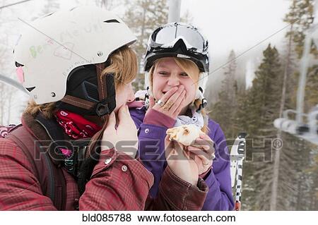 Stock Photo - Skiers laughing. Fotosearch