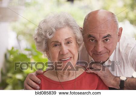 Smiling Hispanic couple View Large Photo Image Stock Photo - Smiling Hispanic couple. Fotosearch