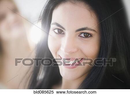 Stock Photography - Smiling Hispanic woman. Fotosearch