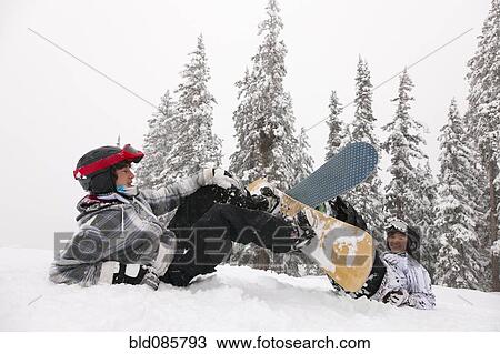 Stock Image - Snowboarders falling. Fotosearch
