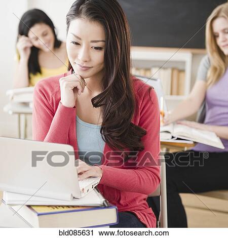 Women studying together in classroom View Large Photo Image Stock Image - Women studying together in classroom. Fotosearch