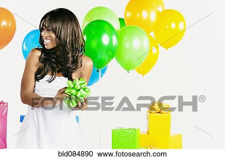 African American woman with birthday presents View Large Photo Image Stock Image - African American woman with birthday presents. Fotosearch