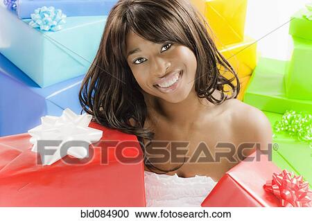 African American woman with birthday presents View Large Photo Image Stock Image - African American woman with birthday presents. Fotosearch