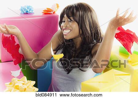 African American woman with birthday presents View Large Photo Image Stock Image - African American woman with birthday presents. Fotosearch