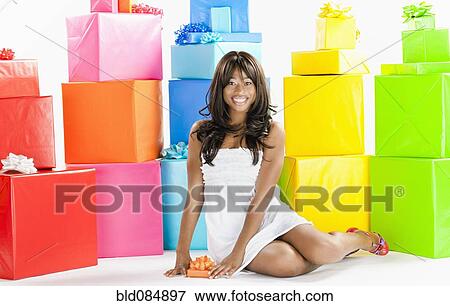 African American woman with birthday presents View Large Photo Image Stock Photo - African American woman with birthday presents. Fotosearch