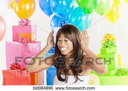 African American woman with birthday presents View Large Photo Image Stock Photograph - African American woman with birthday presents. Fotosearch