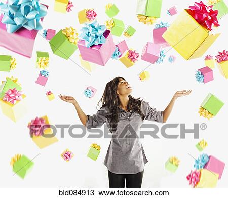 African American woman with falling birthday presents View Large Photo Image Stock Image - African American woman with falling birthday presents. Fotosearch