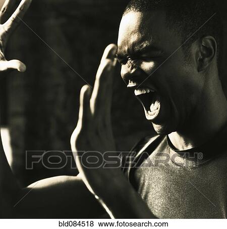 Stock Photo - Angry, shouting man. Fotosearch