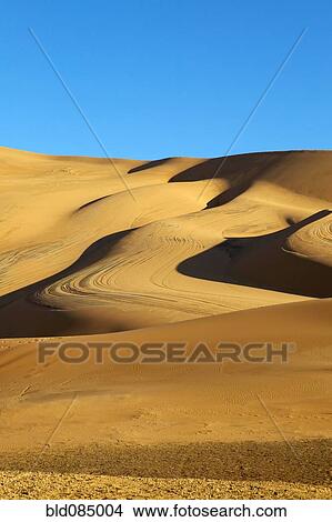 Blue sky and desert sand dunes View Large Photo Image Picture - Blue sky and desert sand dunes. Fotosearch