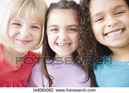 Children grinning together View Large Photo Image Stock Image - Children grinning together. Fotosearch