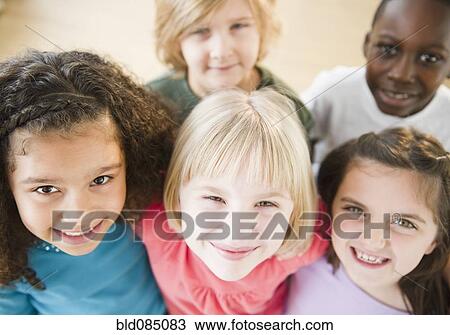 Stock Image - Children smiling together. Fotosearch