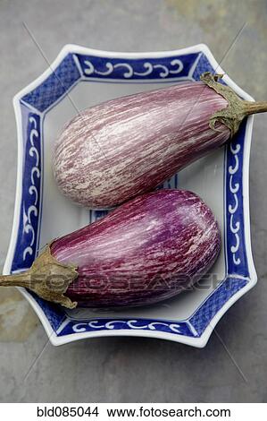 Chinese eggplants in bowl View Large Photo Image Picture - Chinese eggplants in bowl. Fotosearch