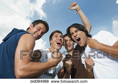 Stock Photo - Friends cheering together. Fotosearch