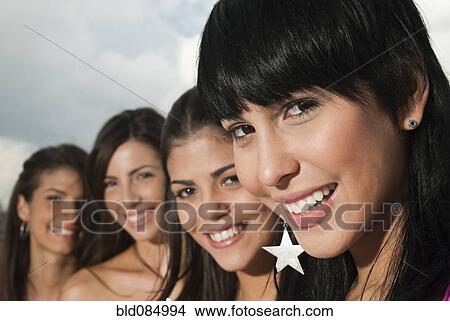 Picture - Friends standing a row. Fotosearch