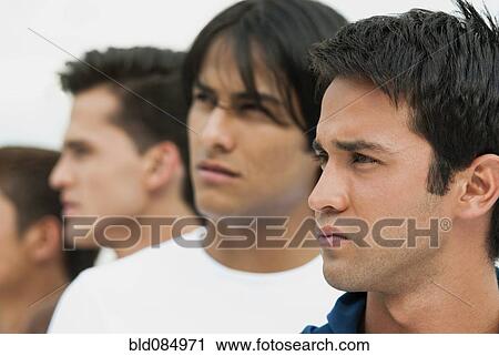 Stock Image - Friends standing in a row. Fotosearch