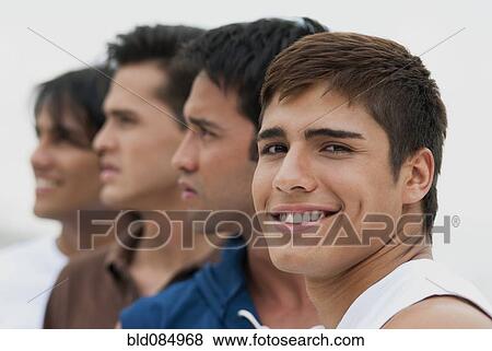 Stock Photo - Friends standing in a row. Fotosearch