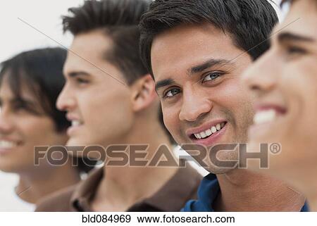 Stock Photo - Friends standing in a row. Fotosearch