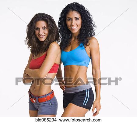 Friends standing together in sportswear View Large Photo Image Picture - Friends standing together in sportswear. Fotosearch