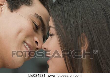 Hispanic couple kissing View Large Photo Image Stock Image - Hispanic couple kissing. Fotosearch