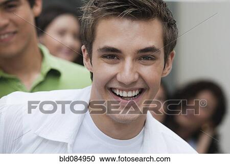 Stock Image - Hispanic friends hanging out together. Fotosearch
