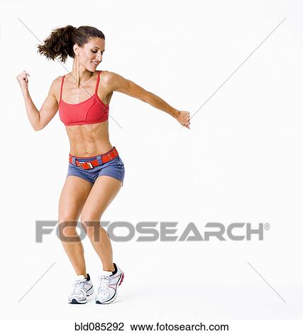 Stock Image - Hispanic woman dancing. Fotosearch