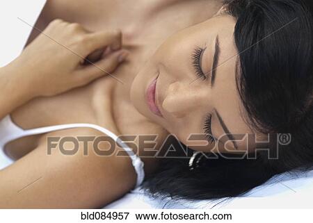 Hispanic woman sleeping View Large Photo Image Stock Photo - Hispanic woman sleeping. Fotosearch