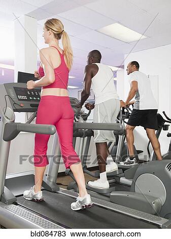 People exercising in health club View Large Photo Image Stock Image - People exercising in health club. Fotosearch