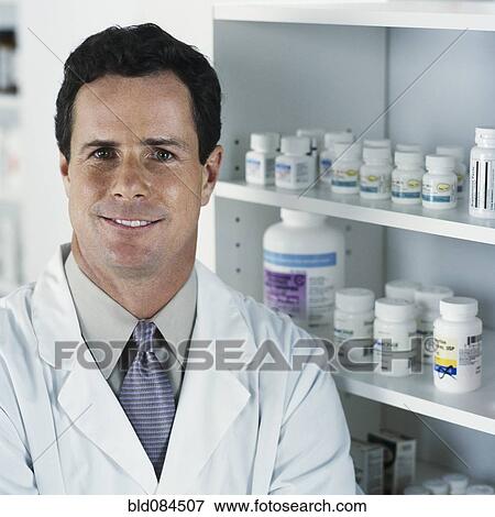 Stock Photo - Pharmacist in drugstore. Fotosearch