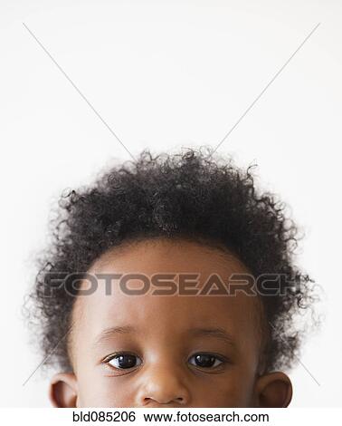 Serious African American boy View Large Photo Image Stock Photograph - Serious African American boy. Fotosearch