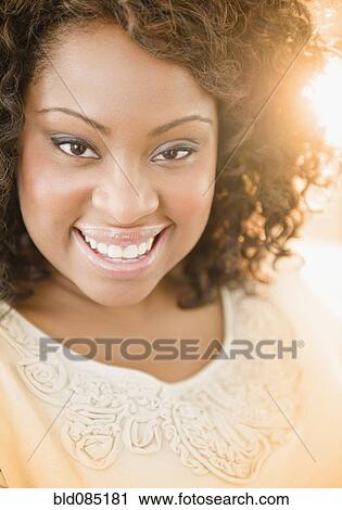 Smiling African American woman View Large Photo Image Stock Image - Smiling African American woman. Fotosearch