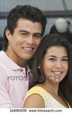 Stock Image - Smiling Hispanic couple. Fotosearch