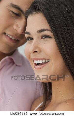 Smiling Hispanic couple View Large Photo Image Stock Photography - Smiling Hispanic couple. Fotosearch