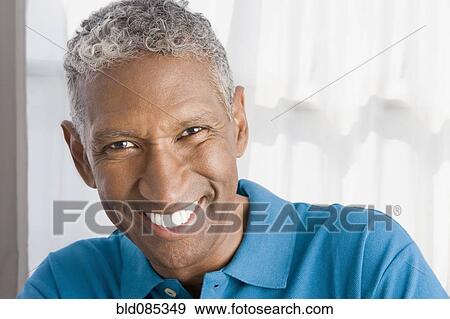 Smiling mixed race man View Large Photo Image Stock Photo - Smiling mixed race man. Fotosearch