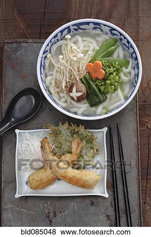 Stock Photo - Udon noodle soup and battered prawn. Fotosearch