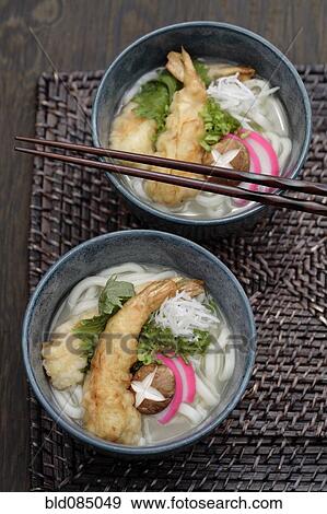 Udon noodle soup and tempura battered prawns View Large Photo Image Stock Photo - Udon noodle soup and tempura battered prawns. Fotosearch